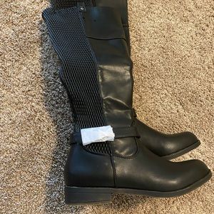 Knee high boots. Ladies knee-high boots